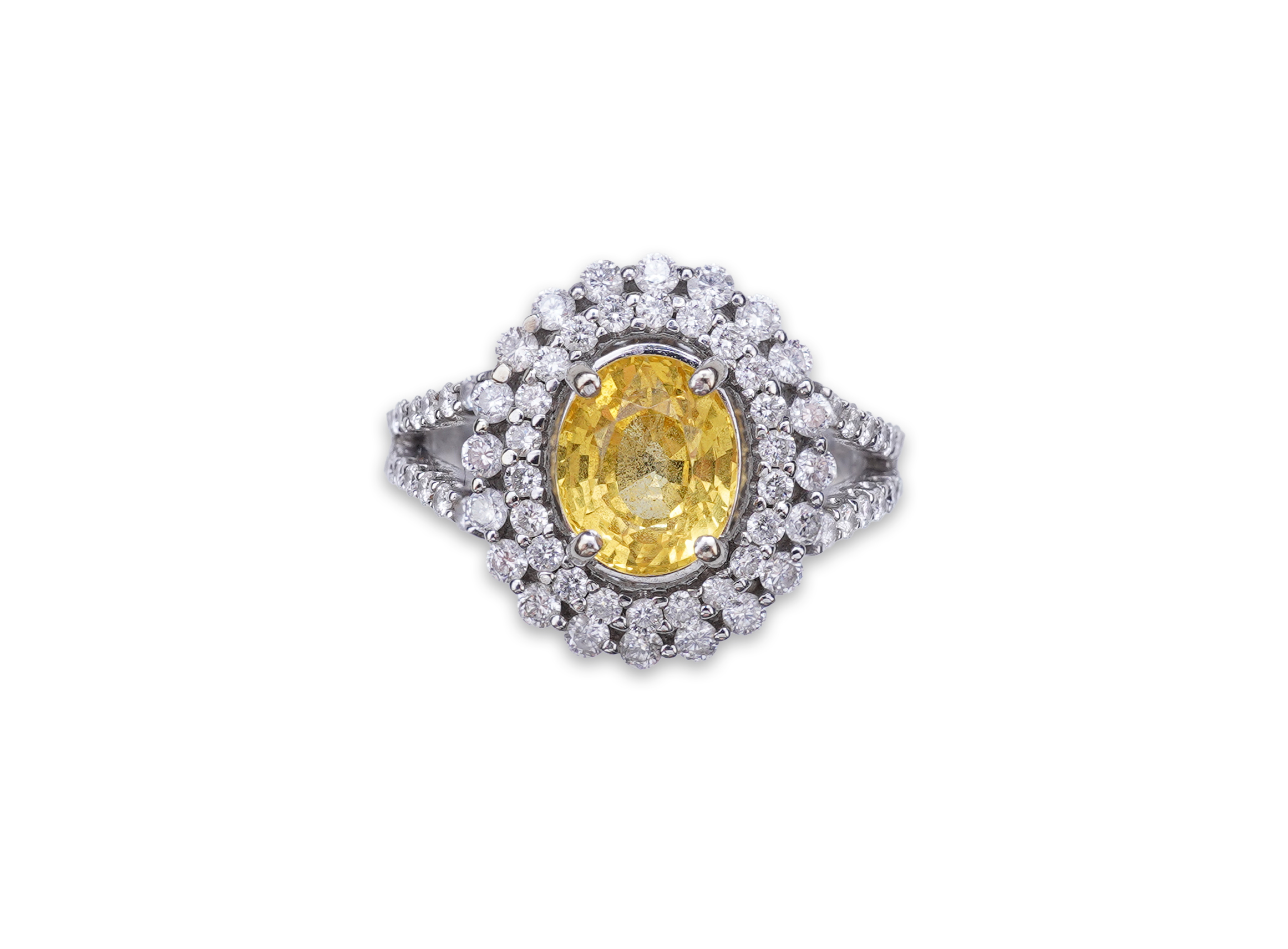 A yellow sapphire and diamond ring